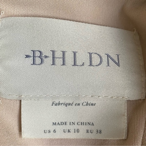 BHLDN nude gown with black mesh overlay, embroidery, and floral appliqué. - Picture 4 of 7